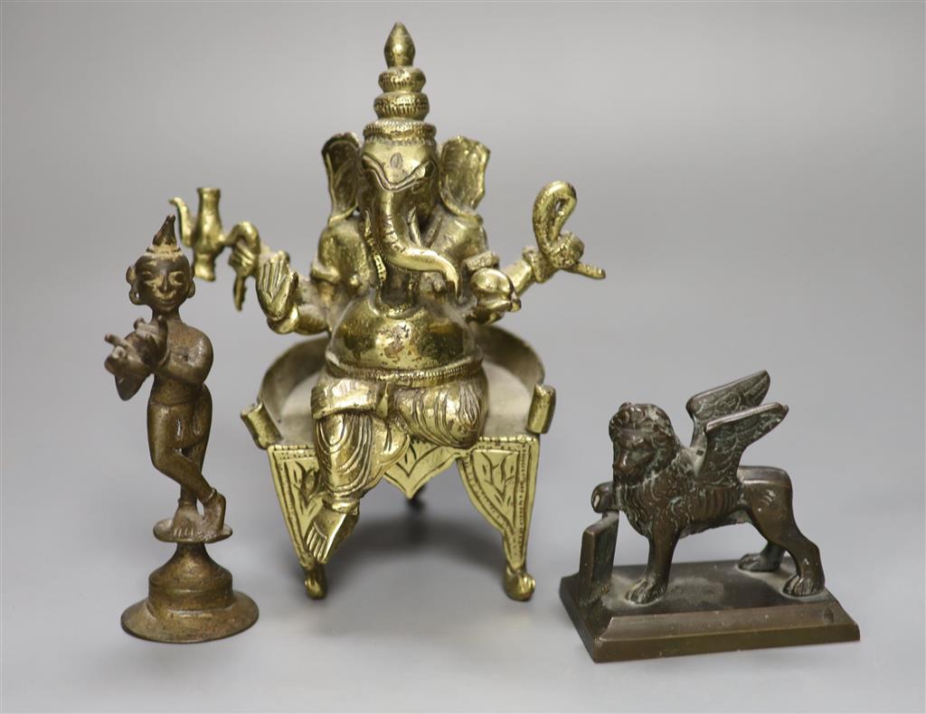 An Indian bronze figure of Ganesh, a bronze of a dancer and a bronze of the Lion of Venice, tallest 18cm